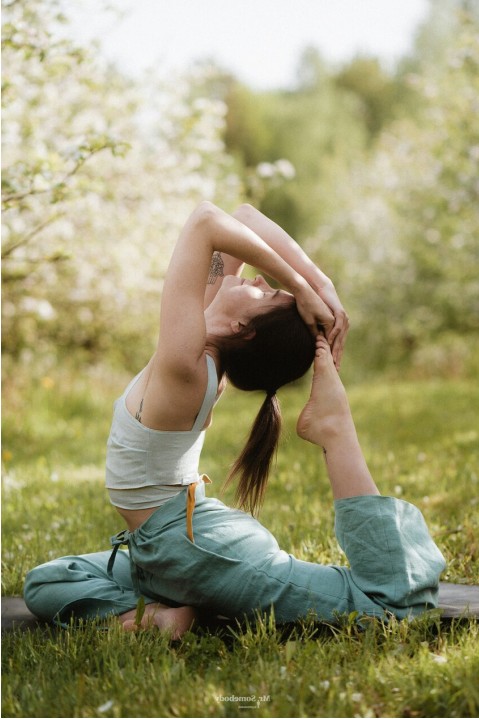Pregnant woman in gentle yoga pose